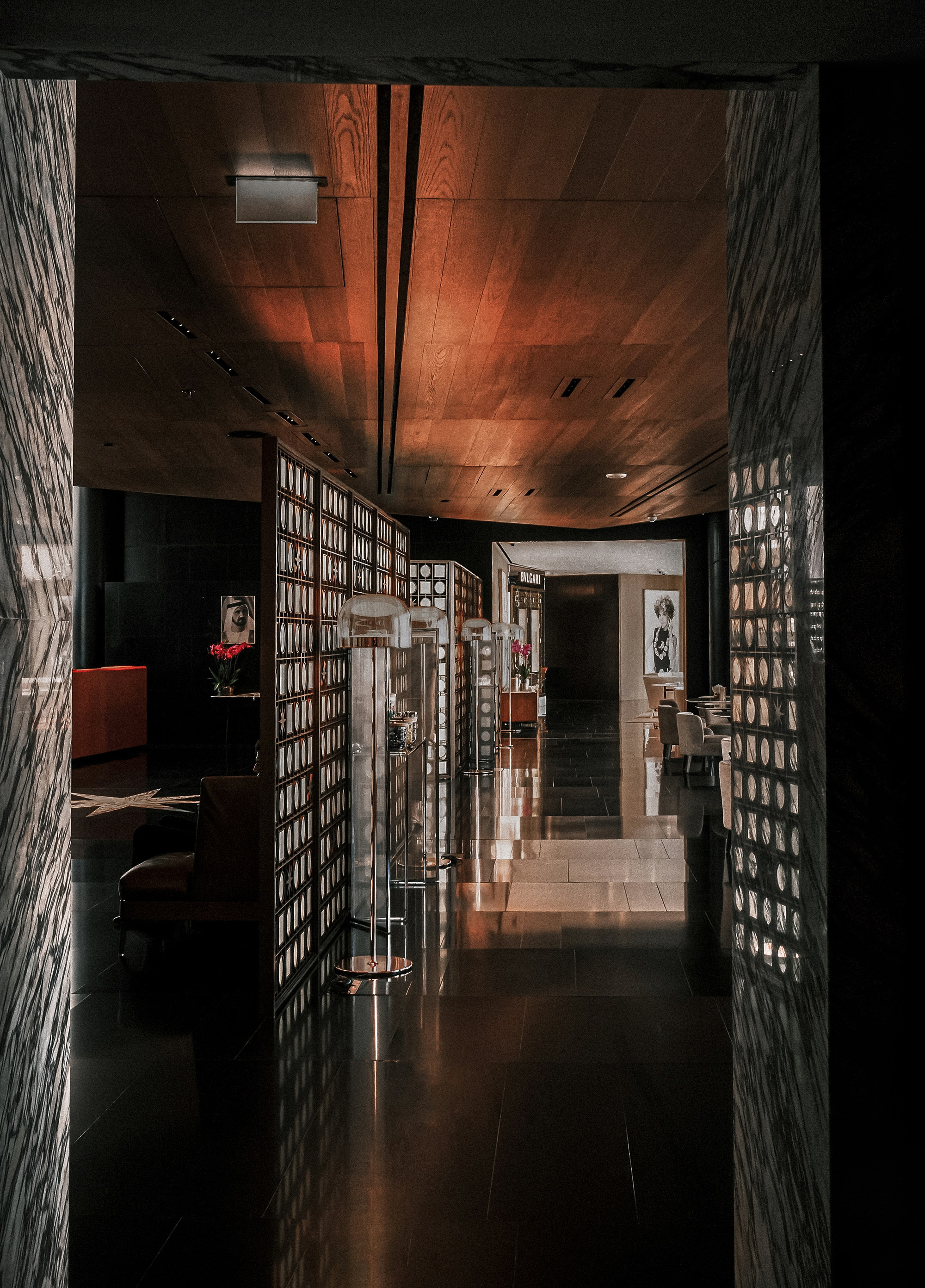 The lobby through the marble threshold