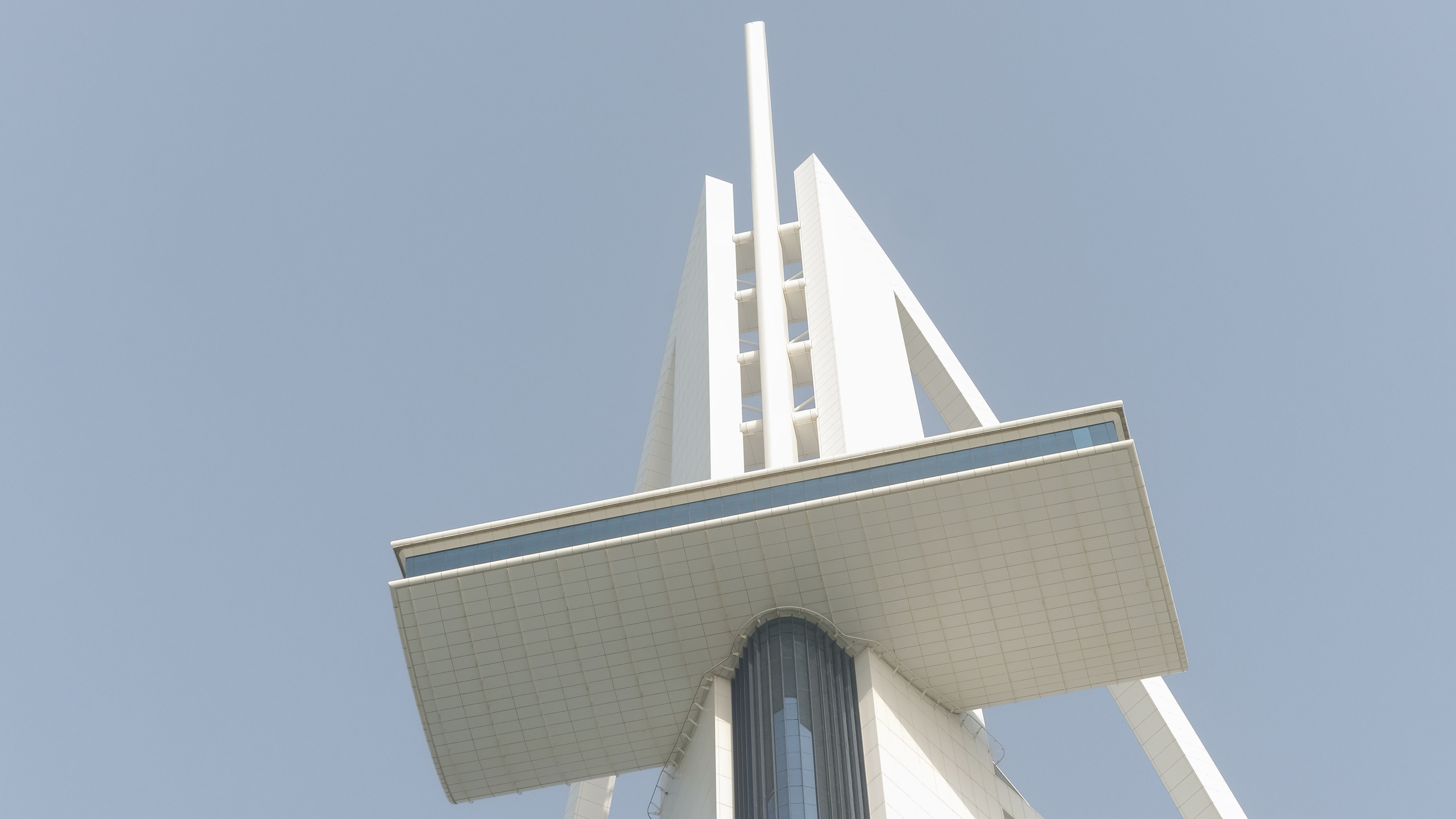 The mast and sail of Burj Al Arab against the morning sky