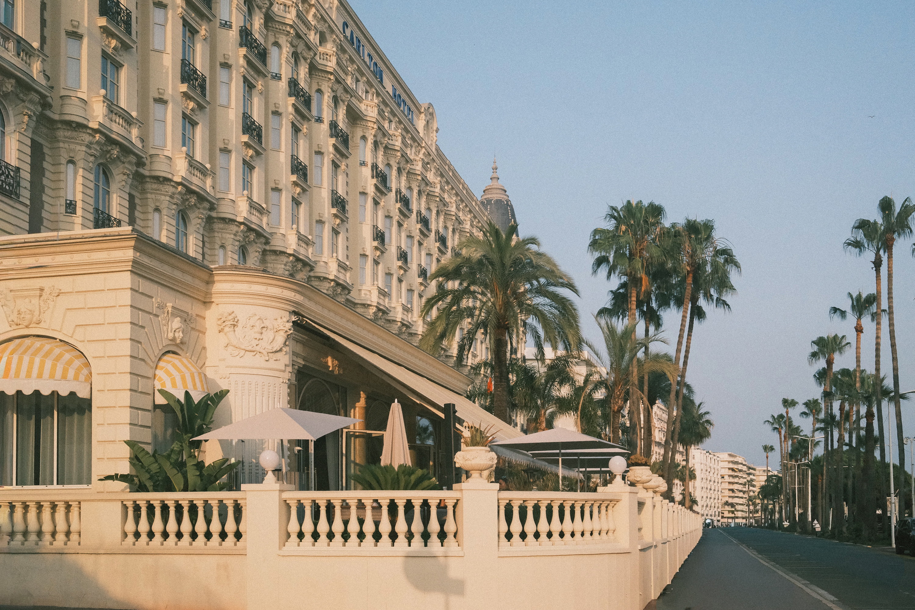 The facade at the golden hour, the Croisette running empty