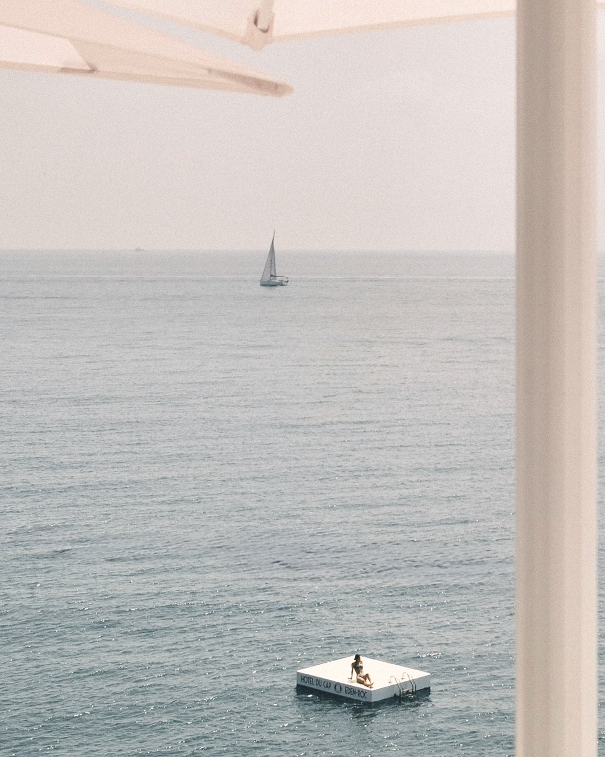 The raft, one bather, the width of the afternoon