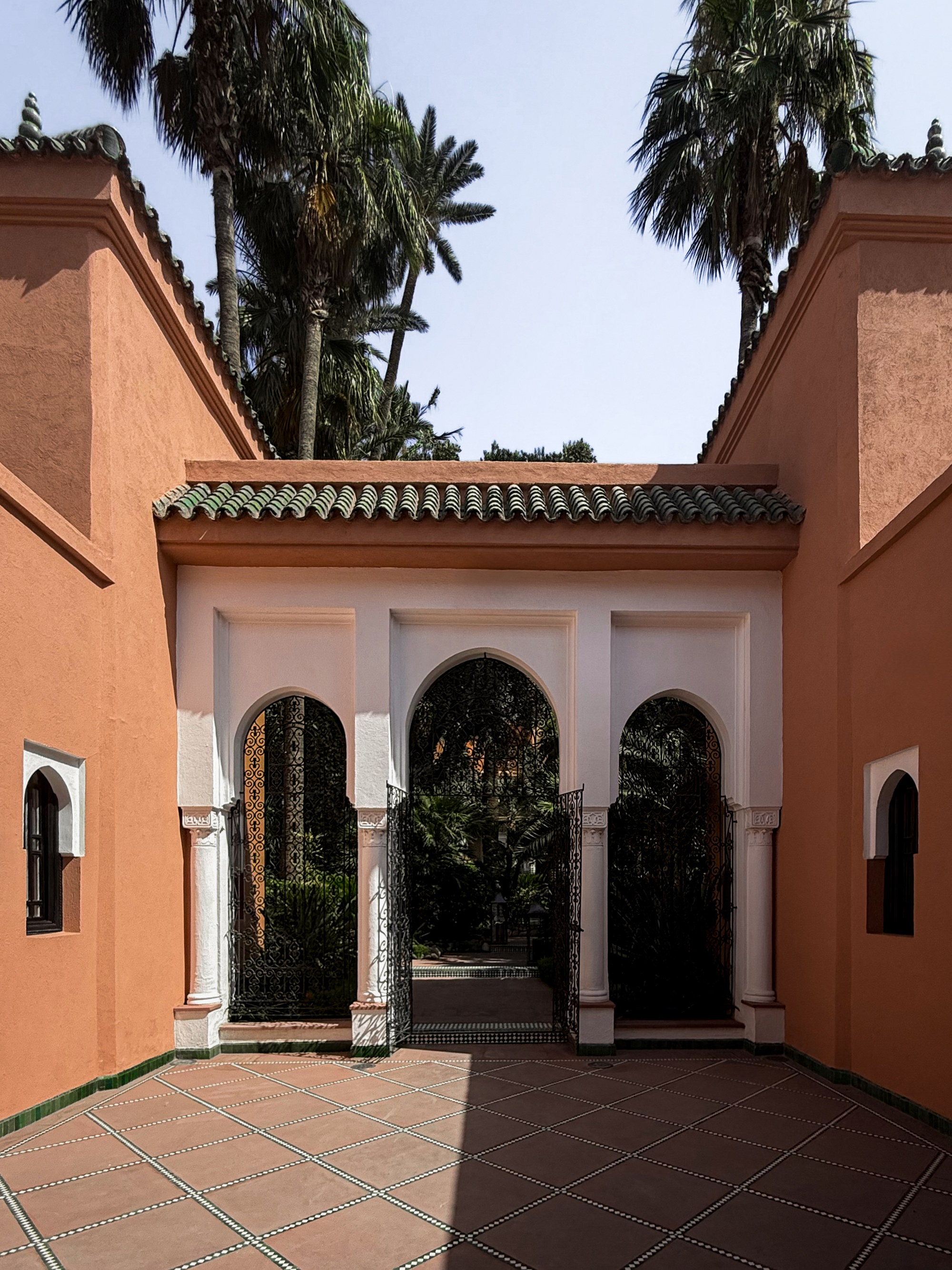 Courtyard arches and afternoon shadow