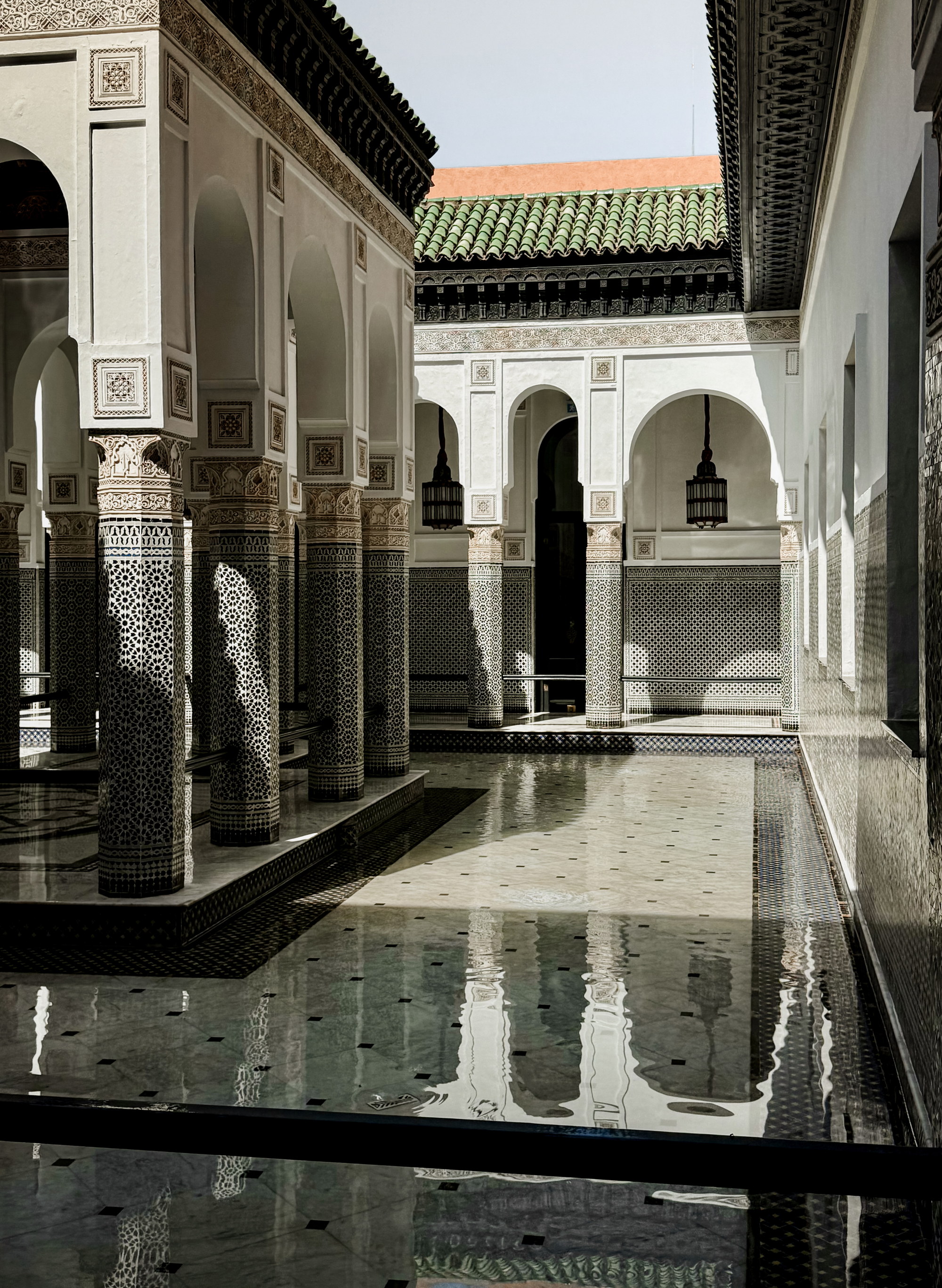 Water court in plan geometry, axis and reflection